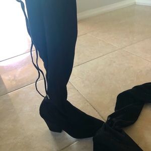 Black suede thigh high heeled boots